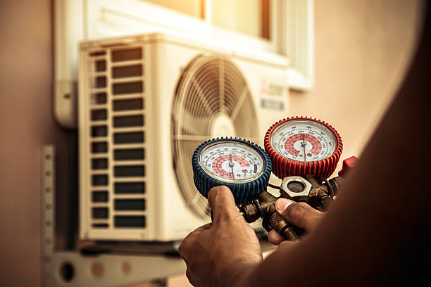 Professional Heat Pump Repair technician working in Phoenix, IL